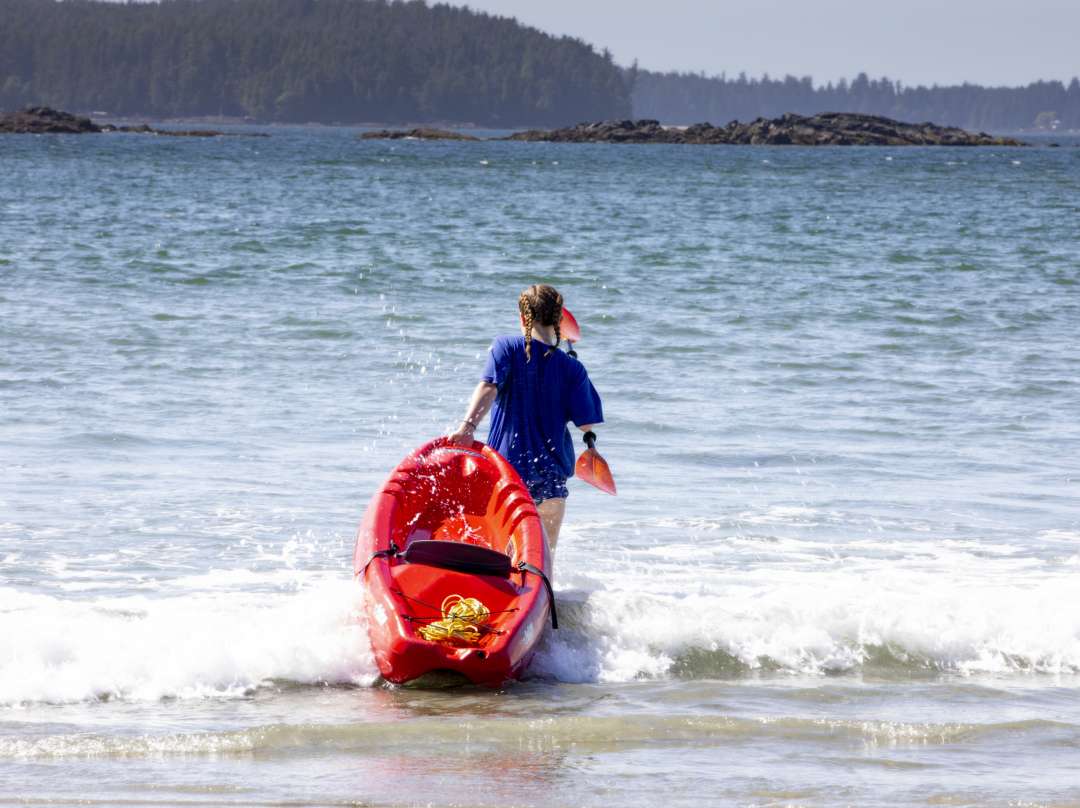 Kayaking at Crystal Cove Beach Resort, the highest-rated Mackenzie Beach accommodation.